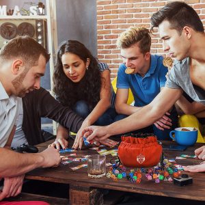 Five People Playing D&D using Cardkingpro Immense Dice Bags – Orange - Pallet Table